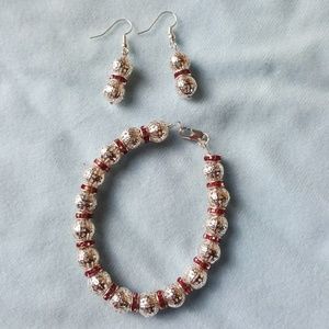 925 closure and earring with pink jewels.